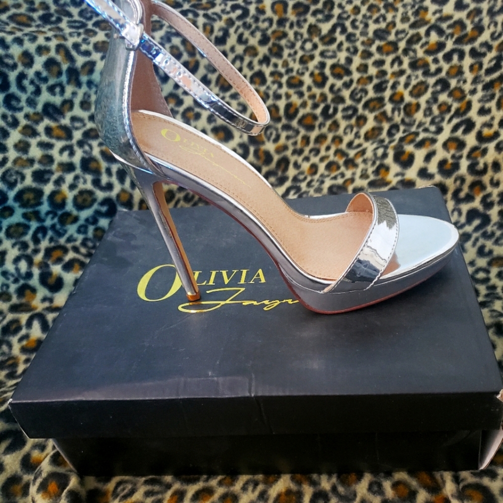 Olivia Ferguson/ silver/ strappy heels